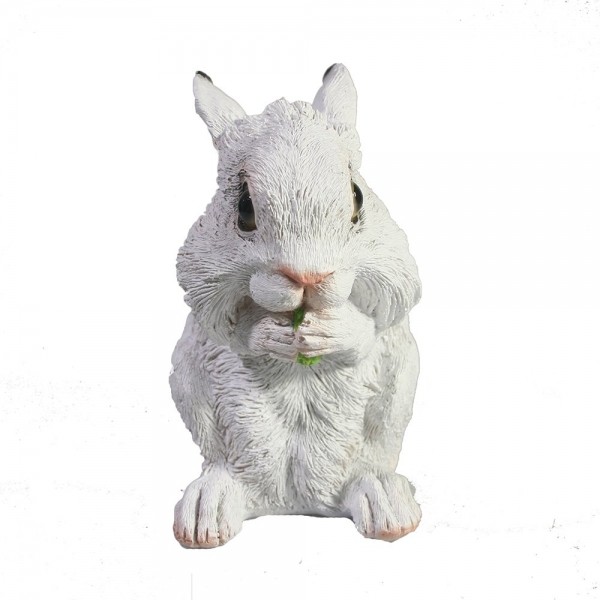 Фигура декоративная "Пушистый кролик ест" (белый) 7х10х12см символ года кот, кролик 2023 81-3188 фото 1 — Egidius.ru